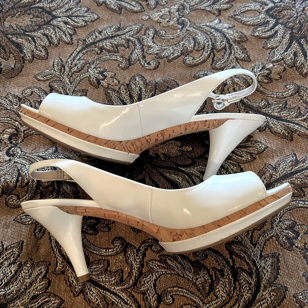 Nine West while heels.  Size 7.5